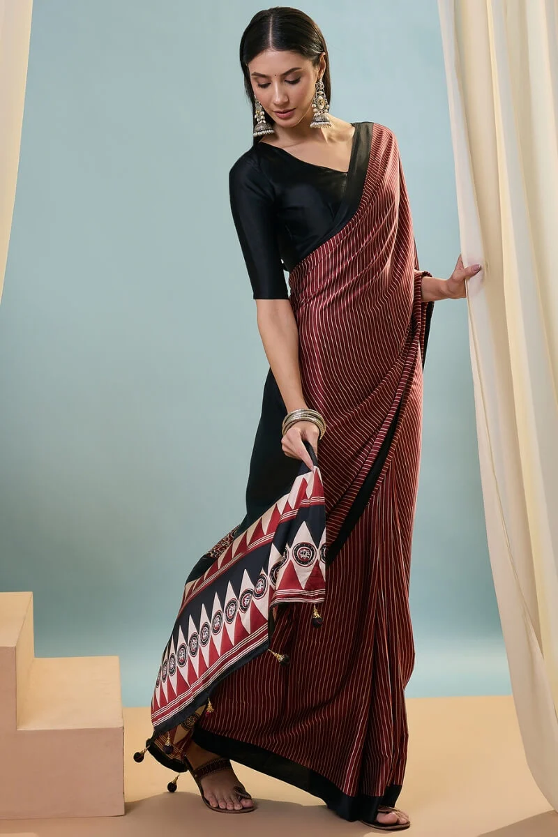 Enthralling Maroon Ajrakh Printed Semi Modal Silk Saree With Desuetude Blouse Piece - Image 3