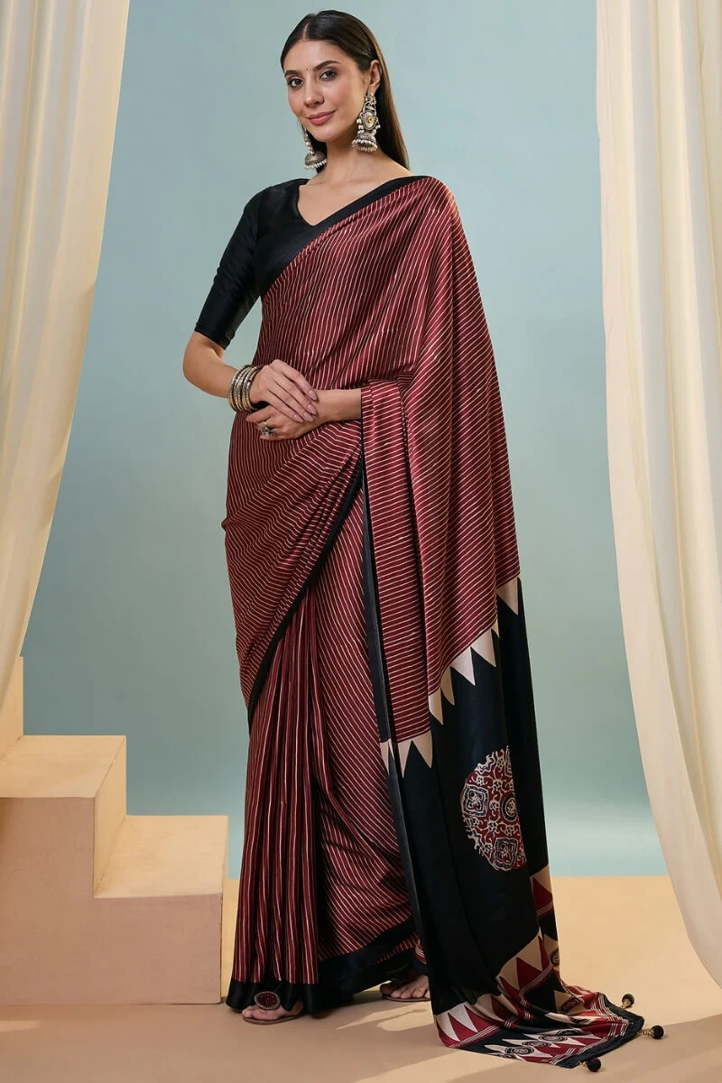 Enthralling Maroon Ajrakh Printed Semi Modal Silk Saree With Desuetude Blouse Piece - Image 4