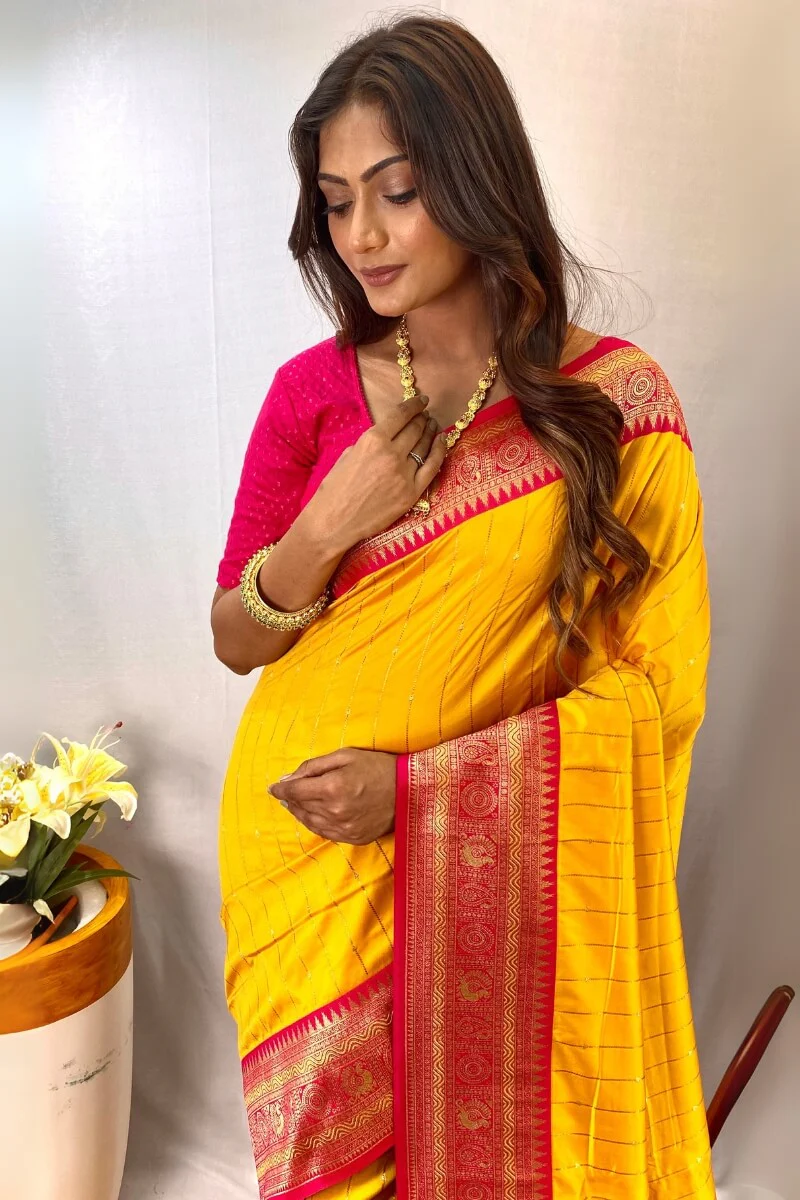 Enthralling Yellow Soft Banarasi Silk Saree With Aplomb Blouse Piece - Image 2
