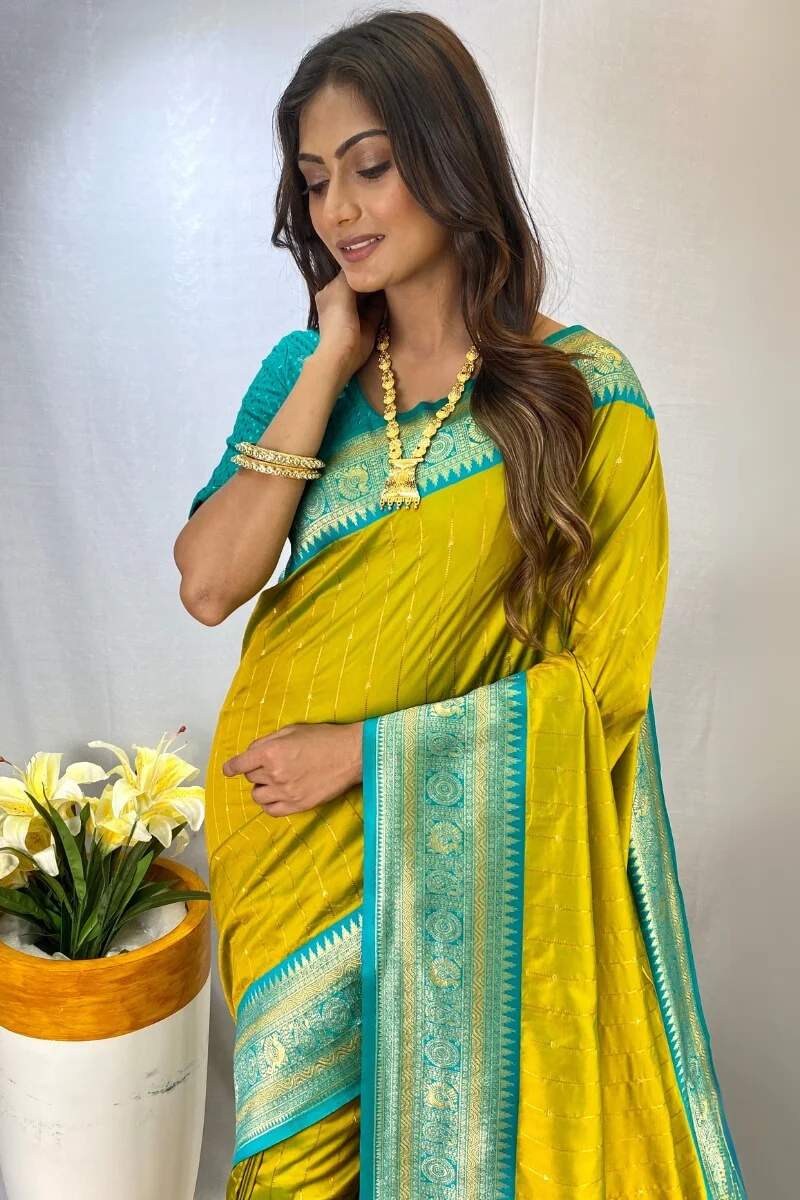 Entrancing Mehndi Soft Banarasi Silk Saree With Exquisite Blouse Piece - Image 2