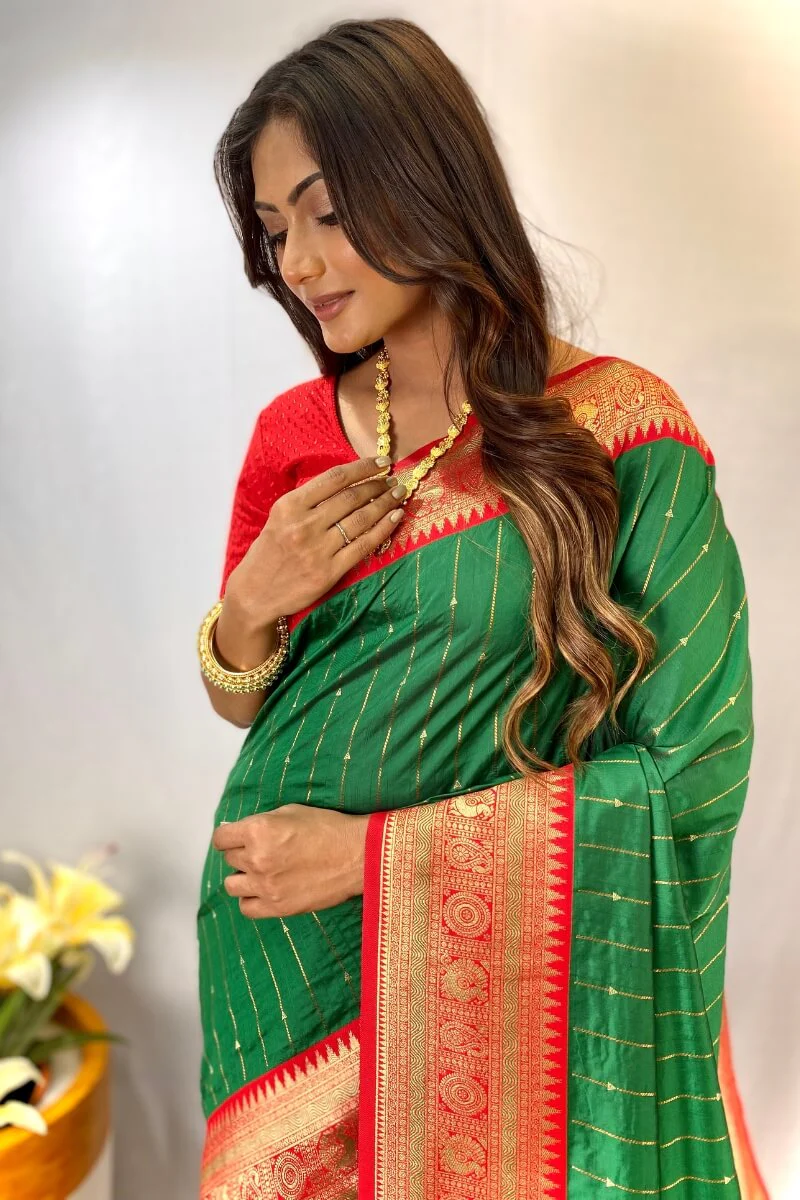 Ethnic Green Soft Banarasi Silk Saree With Delightful Blouse Piece - Image 2