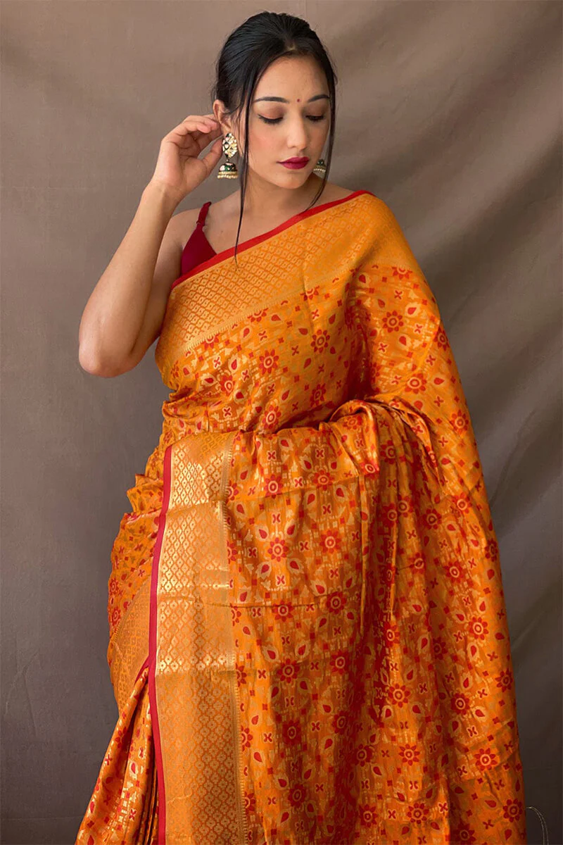 Jubilant Mustard Patola Silk Saree with Lovely Blouse Piece - Image 3