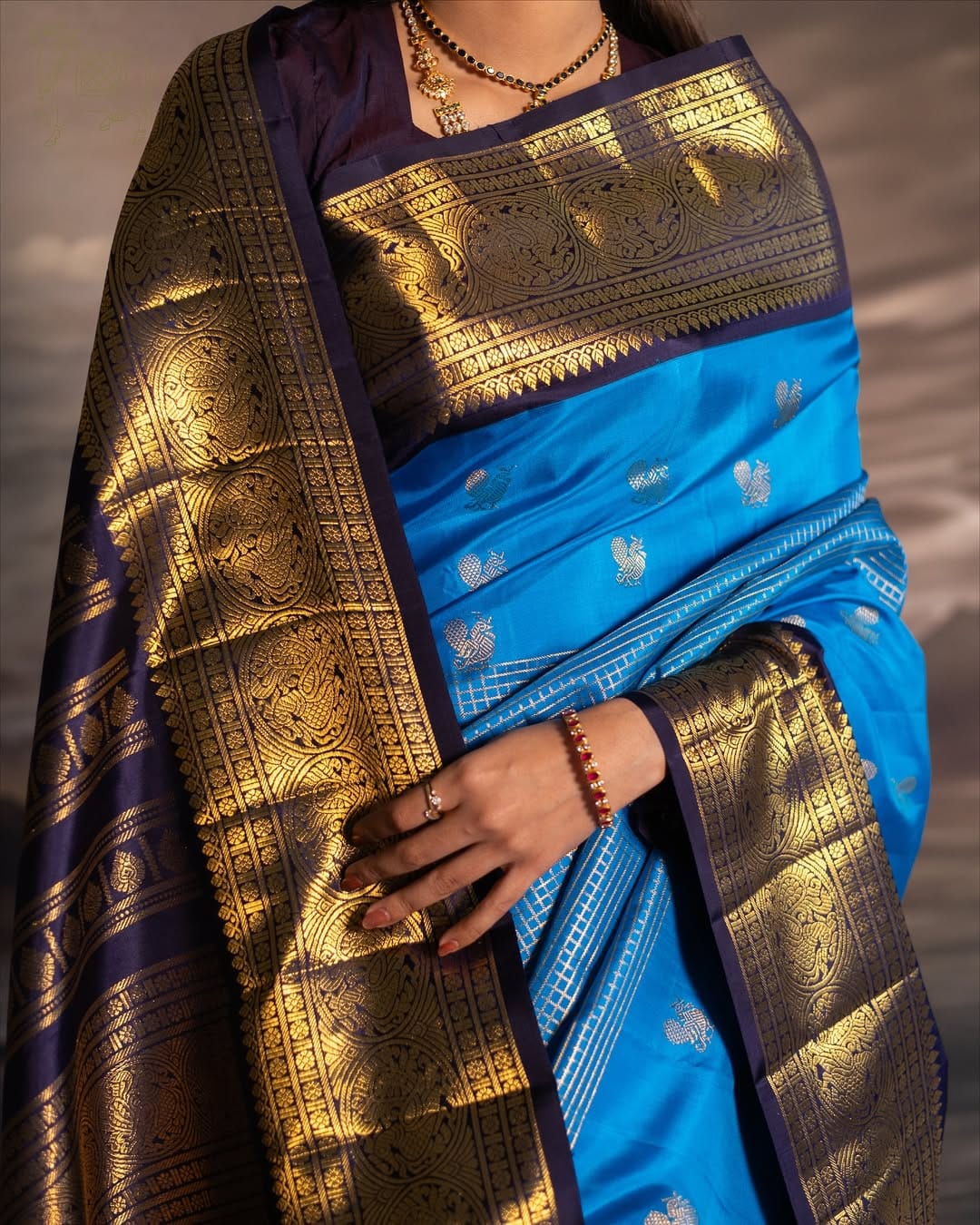 Majestic Firozi Soft Silk Saree With Luminous Blouse Piece - Image 4