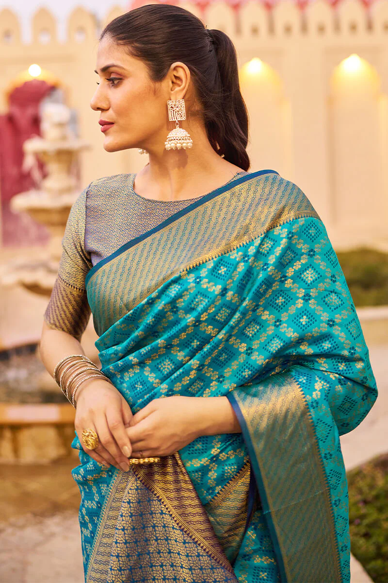 Mesmerising Firozi Patola Silk Saree with Precious Blouse Piece - Image 2