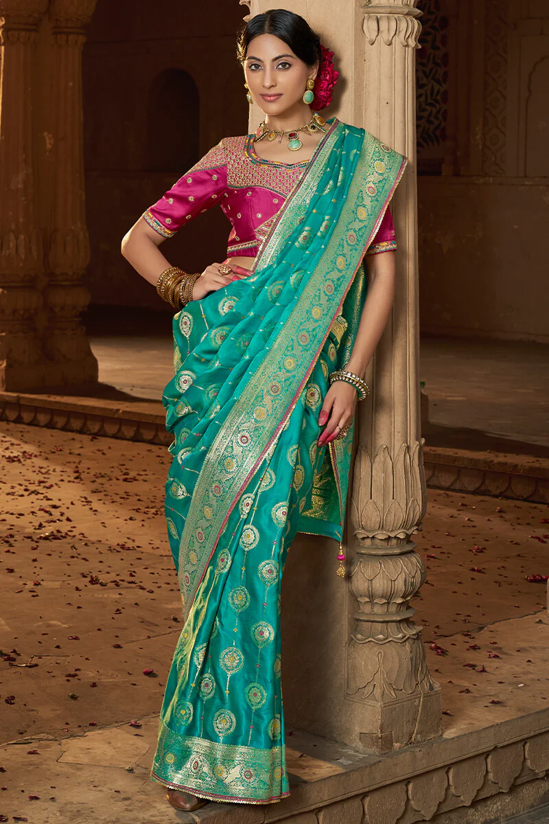 Nectarous Turquoise Banarasi Satin Silk Saree With Glowing Blouse