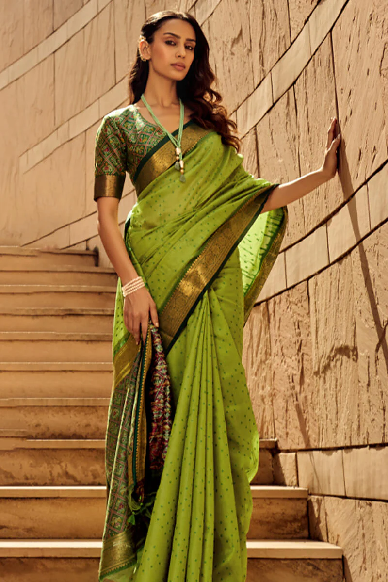 Ornate Green Patola Silk Saree with Tremendous Blouse Piece - Image 3