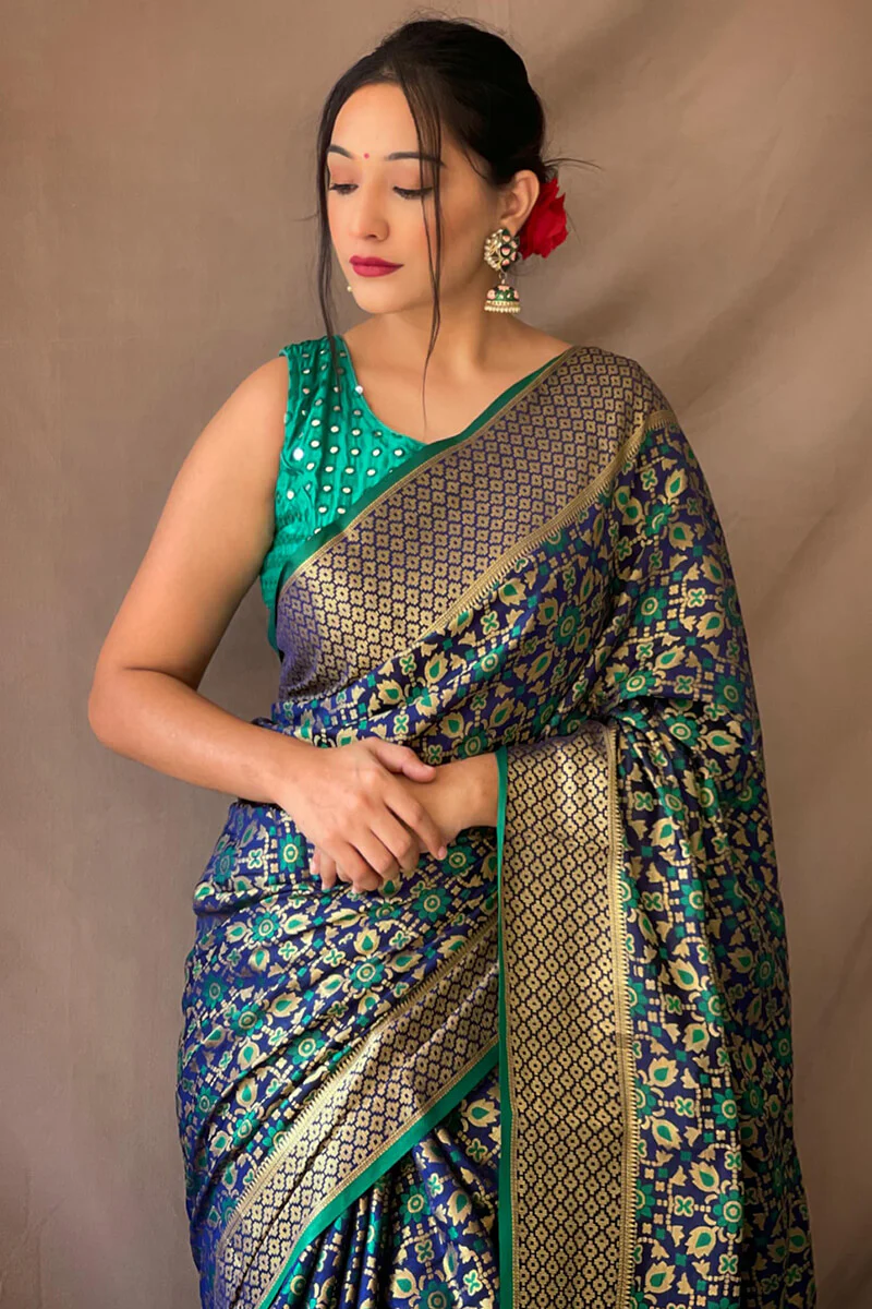 Precious Navy Blue Patola Silk Saree with Nectarous Blouse Piece - Image 2