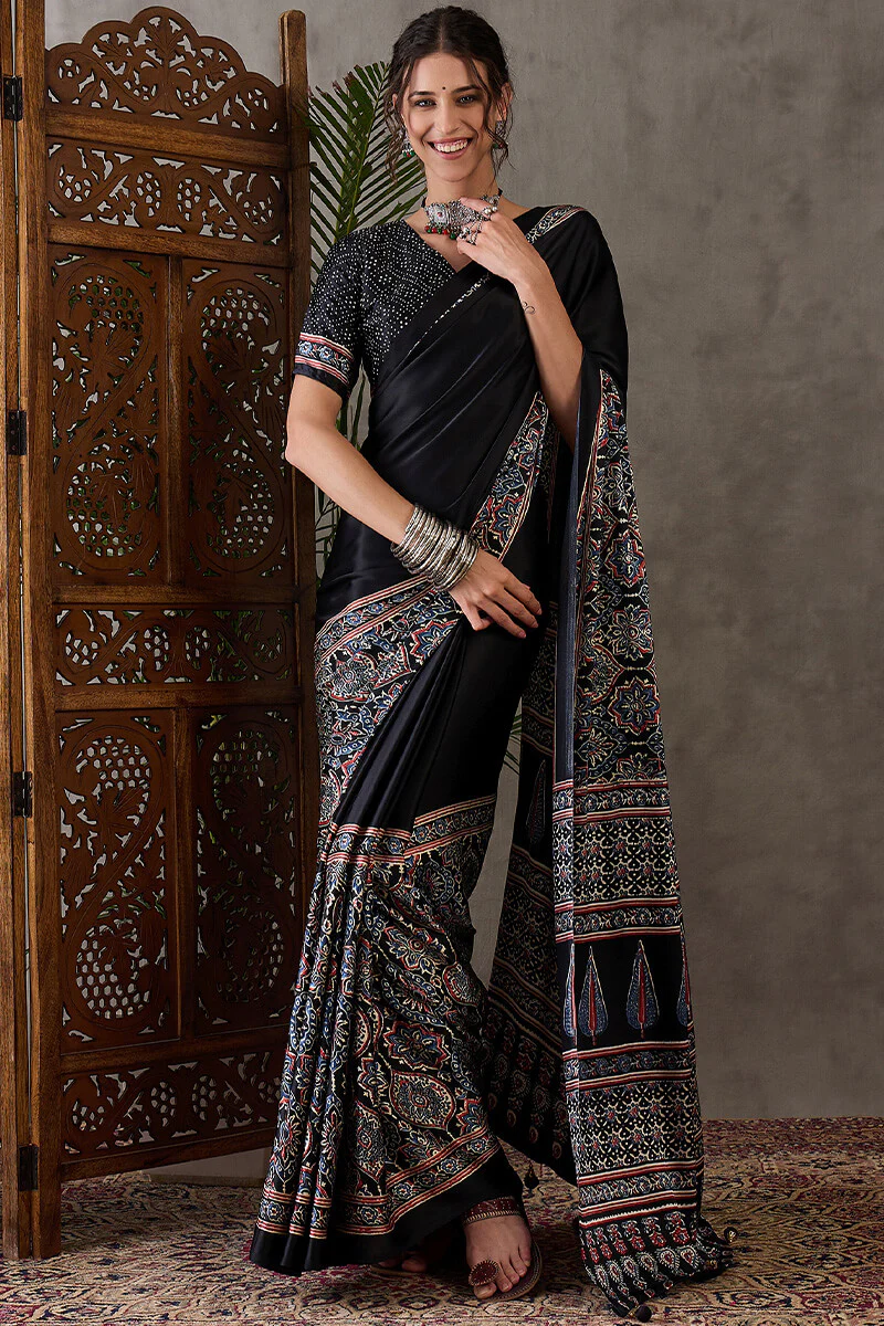 Prettiest Black Ajrakh Printed Semi Modal Silk Saree With Allure Blouse Piece