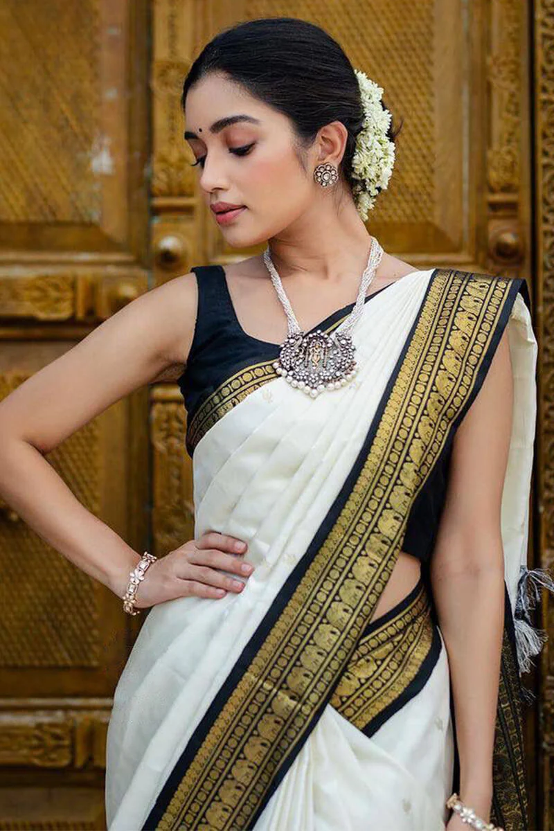 Surpassing Off White Soft Silk Saree With Flameboyant Blouse Piece - Image 2